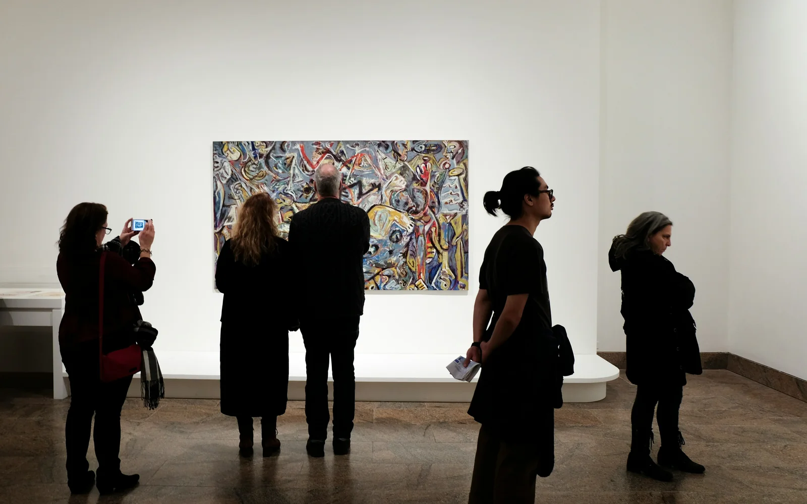 Visitors interacting with a gamified cultural experience.